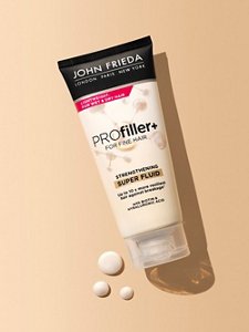 Bottle of John Frieda's PROfiller+ Strengthening Super Fluid for thin, fine hair